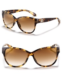 Get spotted in these slight cat eye frames with gradient lenses from Roberto Cavalli.