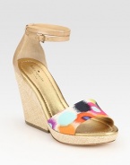 Textured straw wedge with leather trim, an adjustable ankle strap and a modern printed silk upper. Straw wedge, 3 (75mm)Straw platform, 1 (25mm)Compares to a 2 heel (50mm)Leather and printed silk upperLeather lining and solePadded insoleImported