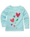 Style her sweetly. Heart graphic appliques on the front of these long-sleeve tees from Osh Kosh give her an extra-adorable look.