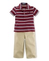 This adorable set pairs a breathable jersey-knit striped polo with a traditional chino pant and a bulldog ribbon belt for preppy, tailored style.