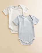 Comfy baby basics in soft cotton knit, offering one dot and one solid design.Envelope shoulders for easy on and off Short sleeves Snap bottom Cotton; machine wash Imported