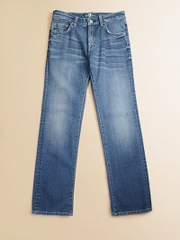 Featuring a subtly faded, medium wash, these cotton jeans will be one of his favorite styles, guaranteed.Button closureZip flyFront whiskeringFive-pocket styleBelt loopsMetal rivet details Slightly distressed pocketsCottonMachine washImported