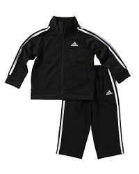 Essential sports gear from Adidas, the lightweight, breathable warm-up jacket and pant will have your athlete prepared and protected for whatever the next quarter calls for.