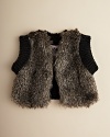 Fun, fashionable and absolutely on-trend, this faux-fur vest revels in a retro-inspired glam she'll love to flaunt.