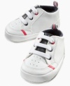 These baby boys soft-sole high-top sneakers from First Impressions will have him kicking in cute style.