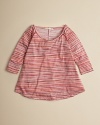 A cute multistripe poncho is detailed with raglan-sleeve stitch accents and a rich multistripe pattern.