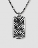 A woven texture in fine sterling silver. Includes 26 silver chain 1W X 1½H Made in USA