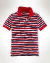 The timelessly preppy short-sleeved polo shirt in striped cotton mesh.