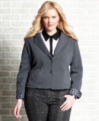 Lend instant sophistication to your fall looks with Dollhouse's plus size two-button blazer.