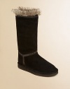 Crafted in supple suede with a fuzzy, faux fur lining, these ultra-cozy, ultra-cute boots will keep her feet warm and dry.Pull-onSuede upperFaux fur liningRubber solePadded faux fur insoleImported