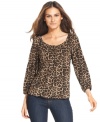 A basic peasant-style top is upgraded by a brilliant animal print, from MICHAEL Michael Kors' petite collection!