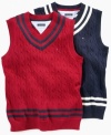 Tennis anyone? Tommy Hilfiger serves up the classic cabled sweater vest-complete with double-striped V-neck-in grand slam style.