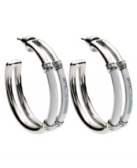 Rev up your look. This Emporio Armani hoop earrings feature logo-embossed white enamel and crystal accents in stainless steel. Approximate diameter: 1 inch.