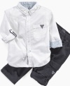 This woven button front shirt and pant set from GUESS? gives him sharp style.