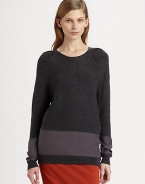 Lengthy, featherweight sweater of merino wool has pleated shoulders and glistening silk panels. RoundneckPleated shouldersLong sleeves with silk panelsSilk panel at hipsLonger length hits below the hipsBody: Merino wool; Contrast: SilkDry cleanImportedModel shown is 5'10 (177cm) wearing US size Small.