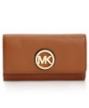 Organization with elegance. Butter-soft leather and  signature golden hardware offer instant appeal to this MICHAEL Michael Kors wallet that discretely conceals plenty of compartments for cash, cards, coins, and other little extras.