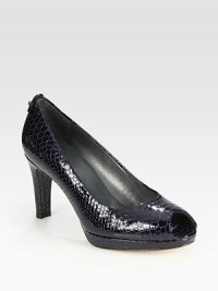 Patent leather in a primal snake print with a chunky heel and platform. Self-covered heel, 3 (75mm)Covered platform, ½ (15mm)Compares to a 2½ heel (65mm)Snake-print patent leather upperLeather lining and solePadded insoleImported