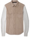 This Sean John shirt blends the warmth of a sweater with the dressier style of a button down.