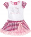 Embrace her girlie side in this fabulously frilly tutu dress from Hello Kitty. (Clearance)