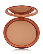 Give yourself a heavenly glow with this silky, luxurious powder bronzer. Unique oil-control complex keeps skin shine-free and comfortable. Smooth, oil-free powder is perfect for giving face, shoulders and decolletage a healthy bronze look. Sweep on all over to enhance existing color or to create the look of a fabulous tan.