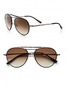 Classic metal aviators feature signature Tom Ford T temples and logo engraved lens. Available in nickel with gradient brown lens.Signature Tom Ford T temples100% UV protectionMade in Italy