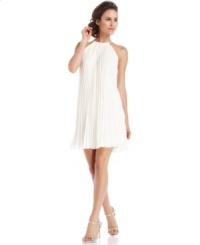 Xscape's dress features a high halter neckline and flattering pleating that creates a trapeze-style silhouette. Pair with jeweled heels for a rehearsal dinner or reception!