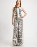 A graphic print in dramatically contrasting tones with solid trim detailing freshens up a classic halter dress design. Self-tie halter neckLong panel in contrast tone on frontContrast trimBack zip closureAbout 46 from natural waistPolyesterDry cleanImportedModel shown is 5'10 (177cm) wearing US size 4.