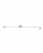 Show your romantic side with Swarovski's interlocking heart bracelet. Made in gold tone mixed metal with crystal embellishments. Approximate length: 7 inches.