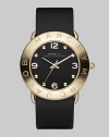 Streamlined timekeeping with a polished goldplated finish and fine leather strap.Quartz movement Water resistant to 3 ATM IP (ionic plated) gold bezel with engraved logo Stainless steel round case, 36mm, (1.42) Black dial IP gold numeral and hour markers Leather strap, 20mm, (.79) Imported 