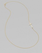 A wispy chain of 14k yellow gold features a cross pendant, punctuated by a single sparkling diamond, set askew for a modern edge.Diamond, .02 tcw 14k yellow gold Length, about 16 Pendant length, about ¾ Spring ring clasp Made in USA