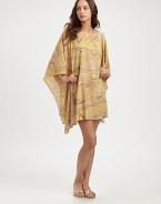 A classic exotic design inspired by the beloved caftan, featuring chic muted colors and a beyond-flattering silhouette. BoatneckKimono sleevesPull-on style85% nylon/15% metallic threadDry cleanMade in Italy