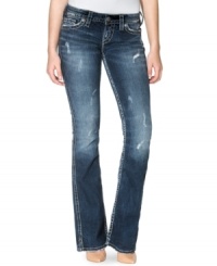 So Twisted: extreme fading and a burst of rips lend rugged-chic style to Silver Jeans' five-pocket bootcut denim.