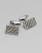 Rectangular sterling silver links are set with hand-twisted wire inlaid within silver bars. Sterling silver About ¼ X ½ Made in the United Kingdom 