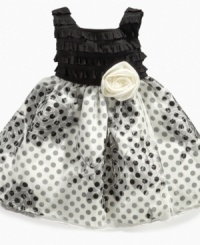 Your little fashionista will be ready to be the talk of the party in this fun polka-dot dress from Sweet Heart Rose.