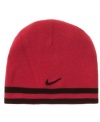 Inside-out. This reversible beanie from Nike gives her a cute, wild style.