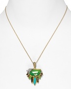 Alexis Bittar gives the perennially chic pendant a cool update with faceted stones and crystal stations. Wear this wow piece to add an eclectic edge to your neckline.