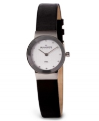 An exquisite picture of elegance. This Skagen Denmark watch features a black leather strap and round stainless steel case. Silvertone dial with Swarovski crystal markers and logo. Quartz movement. Limited lifetime warranty.