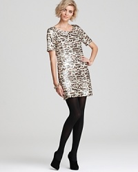 Two of fall's leading trends, animal prints and sparkly sequin embellishments, enliven this PJK Patterson J. Kincaid dress with the sought-after look of the season.