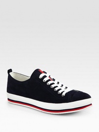 Striped thick sole sets the tone for this charming, casual staple rendered in rich suede.Suede upperRubber soleImported