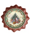 Feel like a kid on Christmas with the Toy's Fantasy pastry plate from Villeroy & Boch. Fine porcelain in a playfully ruffled shape features a beautiful illustration of Santa giving out gifts, surrounded with intricate patterns and classic toys.