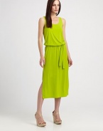 Made from soft jersey and featuring a self-tie detail at its elasticized waist, this dress is the epitome of stylish comfort.ScoopneckSleevelessSelf-tie belt at elasticized waistSide slitsAbout 38 from natural waist94% polyester/6% spandexMachine washImported Model shown is 5'10 (177cm) wearing US size Small. 