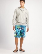 Classic swim trunk style comes to life in a bright floral print pattern, with side pocket detail in quick-drying nylon.Drawstring tie waistInseam, about 10Fully linedPolyesterMachine washImported