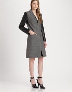 Power dressing in its finest form, this tailored, wool-rich coat has modern seaming, croc-print faux leather sleeves and a back vent for comfort. V-neckCroc-print faux leather sleevesSlash pocketsBack ventAbout 39 from shoulder to hem80% virgin wool/20% polyamideDry cleanImported of Italian fabricModel shown is 5'10 (177cm) wearing US size 2.