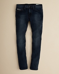 Diesel Boys' Thanaz Slim Fit Skinny jeans feature front and back pockets with a Diesel logo, perfect for everyday wear.