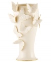 The essence of whimsy, this Lenox Flutter vase will lift your spirits with gold-tipped butterflies and elegant banding in timeless ivory porcelain.