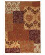 A fresh, modern floral-and-damask motif pops in ginger and other red-tinged tones, captured in a perfect patchwork on this plush area rug from Karastan. Woven from lush nylon that delivers softness underfoot and superb resistance to everyday wear.