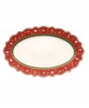 Play up the fun with this Toy's Delight oval platter from Villeroy & Boch. Fine porcelain in a playfully ruffled shape is trimmed with intricate patterns, classic toys and festive decorations to create magical holiday setting.