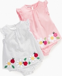 Daisy flowers and dainty ladybugs adorn the border of this delightful and breezy dot sundress by First Impressions.