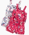 A blooming beauty. Smiles will blossom all-around when she's in this darling floral romper from Guess.