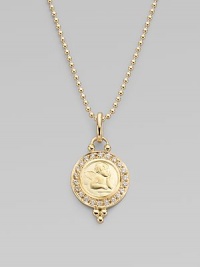 A classic cherub, sweetly embossed on a disc of gleaming 18k yellow gold, surrounded by sparkling pavé diamonds. Diamonds, 0.22 tcw 18k yellow gold Length, about ¾ Diameter, about ½ Spring ring clasp Imported Please note: Necklace sold separately.